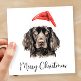 Fun Christmas Card of a Black Cocker Spaniel Dog Wearing A Santa Hat Whimsical Watercolour Christmas Card For Animal Lover For Him or Her