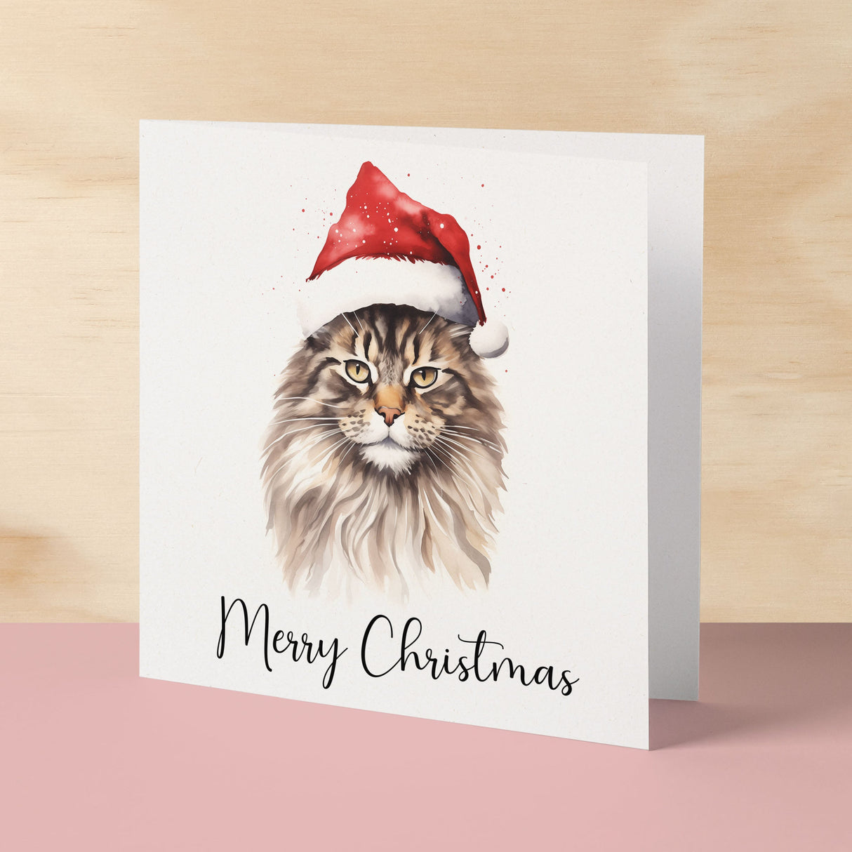 Fun Christmas Card of a Maine Coon Cat Wearing A Santa Hat Whimsical Watercolour Christmas Card For Animal Lover For Him or Her