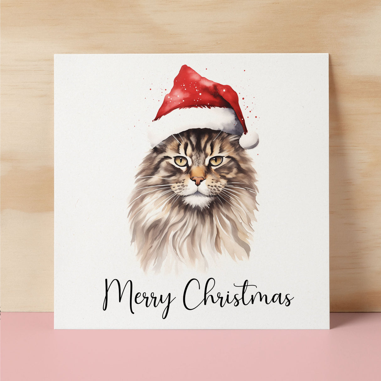 Fun Christmas Card of a Maine Coon Cat Wearing A Santa Hat Whimsical Watercolour Christmas Card For Animal Lover For Him or Her