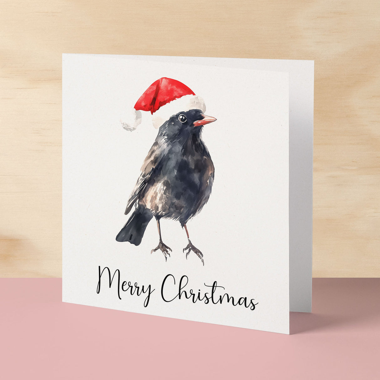 Fun Christmas Card of a Black Bird Wearing A Santa Hat Whimsical Watercolour Christmas Card For Bird Lover For Him or Her