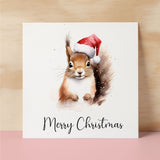 Fun Christmas Card of a Squirrel Wearing A Santa Hat Whimsical Watercolour Christmas Card For Animal Lover For Him or Her