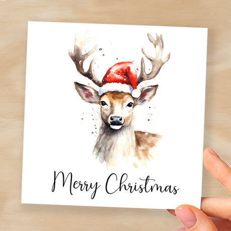 Fun Christmas Card of a Stag Wearing A Santa Hat Whimsical Watercolour Christmas Card For Animal Lover For Him or Her