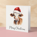 Fun Christmas Card of a Cow Wearing A Santa Hat Whimsical Watercolour Christmas Card For Animal Lover For Him or Her