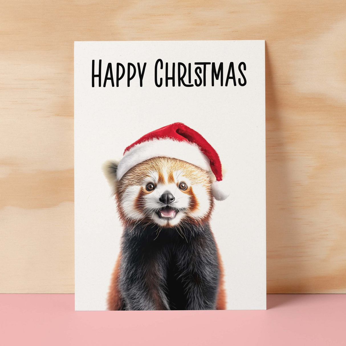 Fun Christmas Card of a Red Panda Wearing A Santa Hat Whimsical Christmas Card For Animal Lover For Him or Her