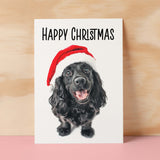 Fun Christmas Card of a Black Cocker Spaniel Dog Wearing A Santa Hat Whimsical Christmas Card For Animal Lover For Him or Her