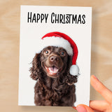 Fun Christmas Card of a Chocolate Cocker Spaniel Dog Wearing A Santa Hat Whimsical Christmas Card For Animal Lover For Him or Her