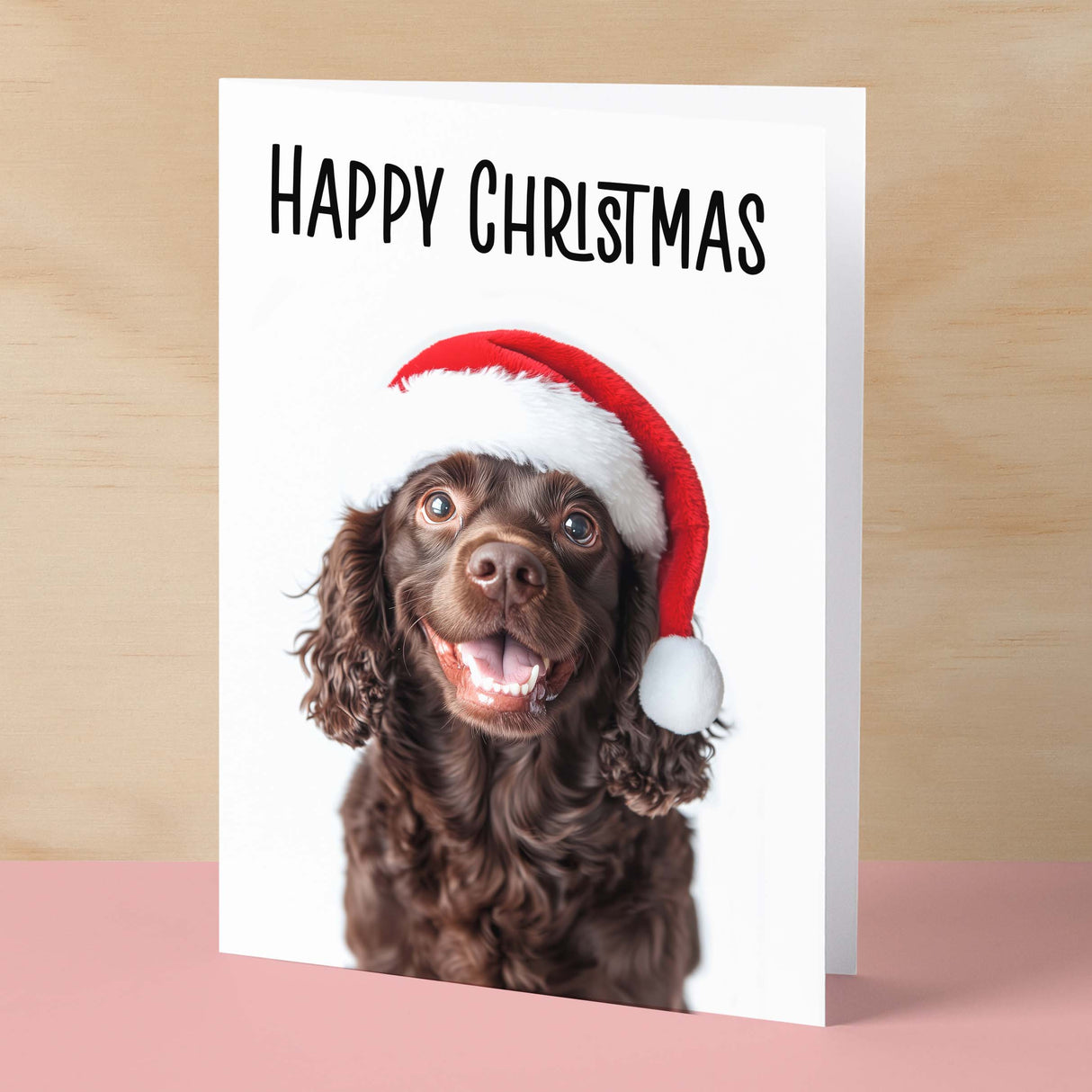 Fun Christmas Card of a Chocolate Cocker Spaniel Dog Wearing A Santa Hat Whimsical Christmas Card For Animal Lover For Him or Her