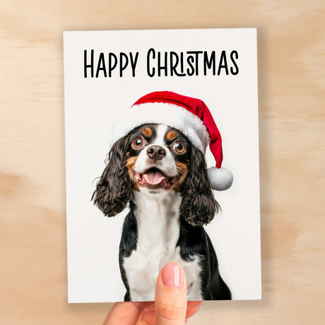 Fun Christmas Card of a Cavalier Spaniel Dog Wearing A Santa Hat Whimsical Christmas Card For Animal Lover For Him or Her