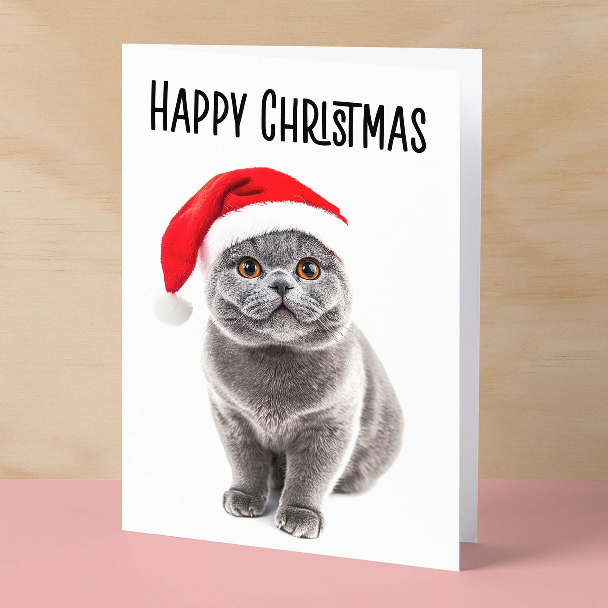 Fun Christmas Card of a British Shorthair Cat Wearing A Santa Hat Whimsical Christmas Card For Animal Lover For Him or Her