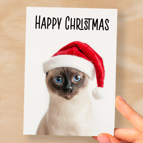 Fun Christmas Card of a Siamese Cat Wearing A Santa Hat Whimsical Christmas Card For Animal Lover For Him or Her