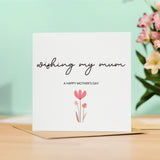 A simple, cute Mother's Day card for Mum, featuring a lovely flower design to wish her a happy Mother's Day.